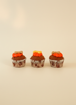 The Barking Bakery Mini Iced Trios · Orange